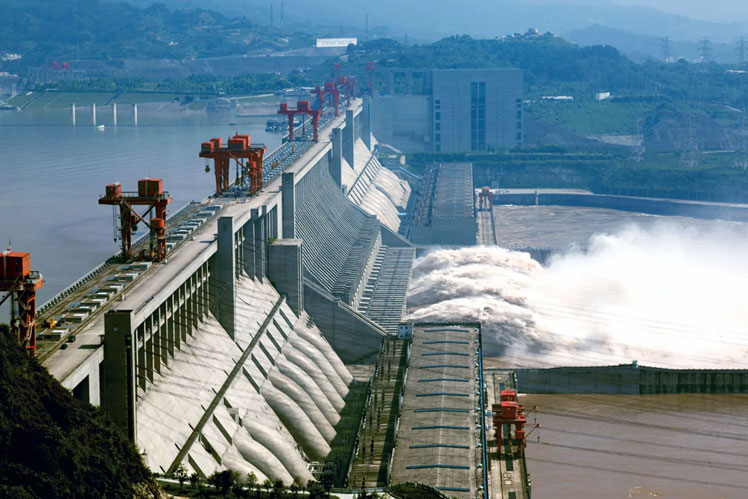 Three Gorges Dam เขื่อนสามผา ณ ใกล้เมือง Yichang มณฑล Hubei ประเทศจีน  ภาพจาก Yao YilongImaginechina/AP Images