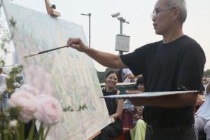 ภาพวาดกลางสวนกุหลาบ ที่ผลิบานในเทศกาล Bangkok Design Week 2026